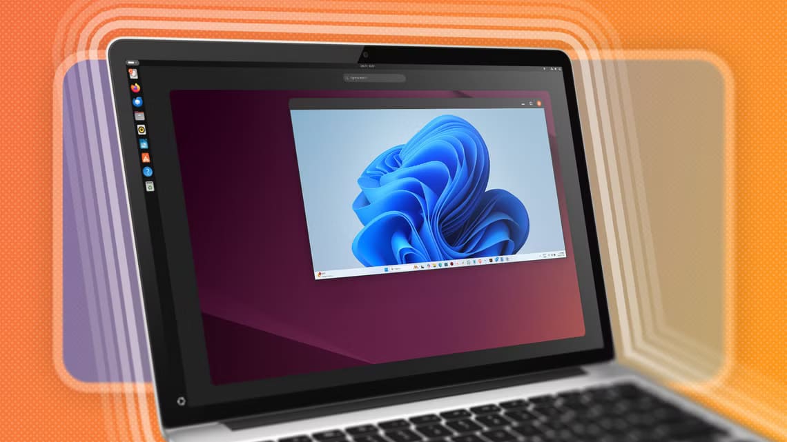 a-laptop-with-ubuntu-with-windows-running-inside-it كيف تعمل الآلات الافتراضية ولماذا تعد أداة أساسية في التكنولوجيا الحديثة