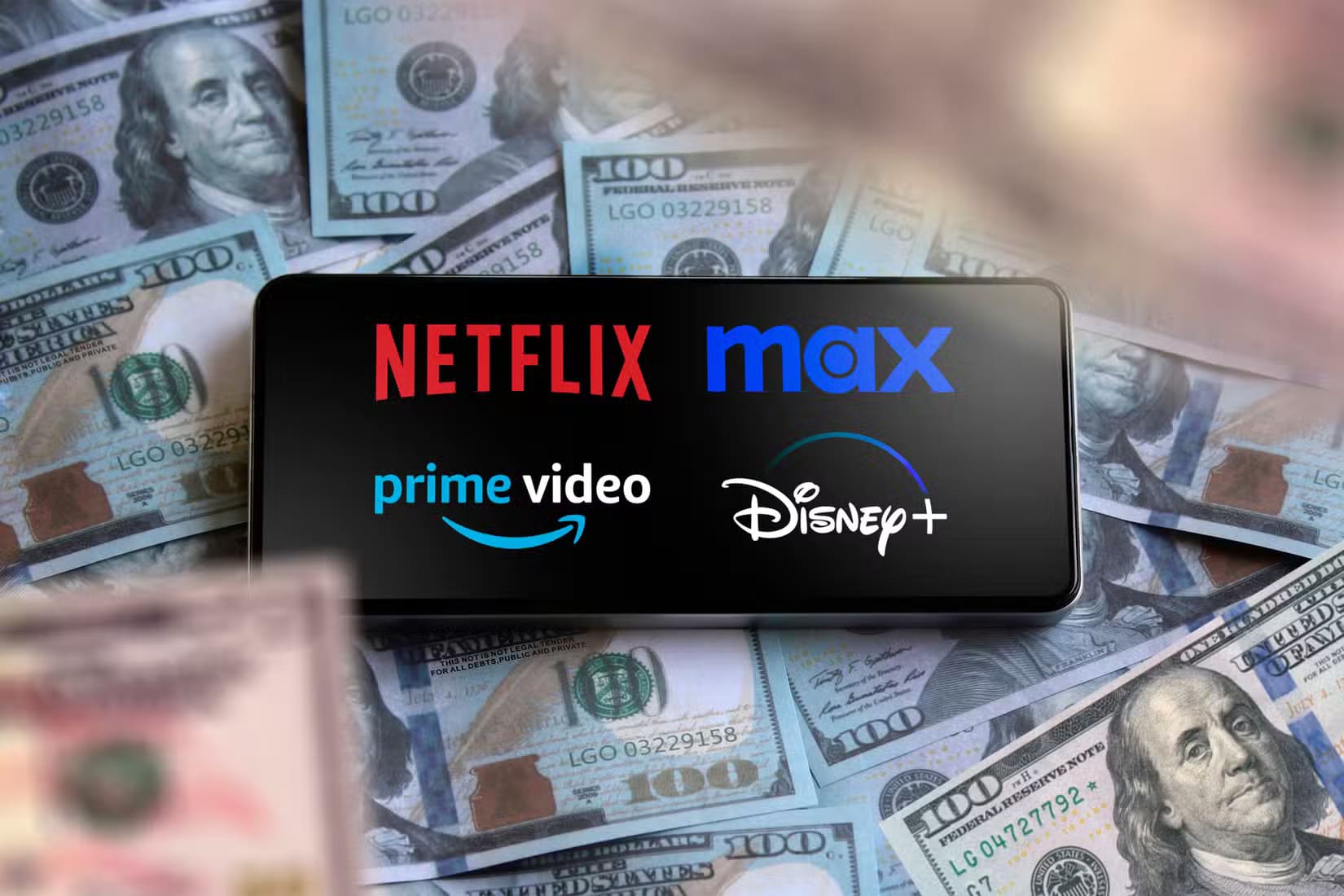 a-phone-above-some-dollar-bills-and-the-logos-of-some-streaming-services-on-the-screen Netflix في 2025: هل ما زالت الخيار الأفضل لمشاهدة الأفلام والمسلسلات؟