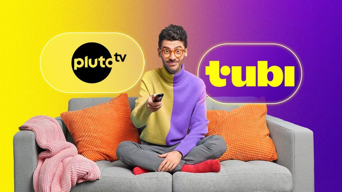 a-guy-on-his-couch-holding-the-tv-remote-with-the-logos-of-pluto-tv-and-tubi-beside-him مقارنة بين Pluto TV وTubi لاختيار أفضل خدمة بث مجانية تناسبك